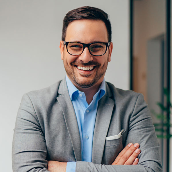 man in suit smiling